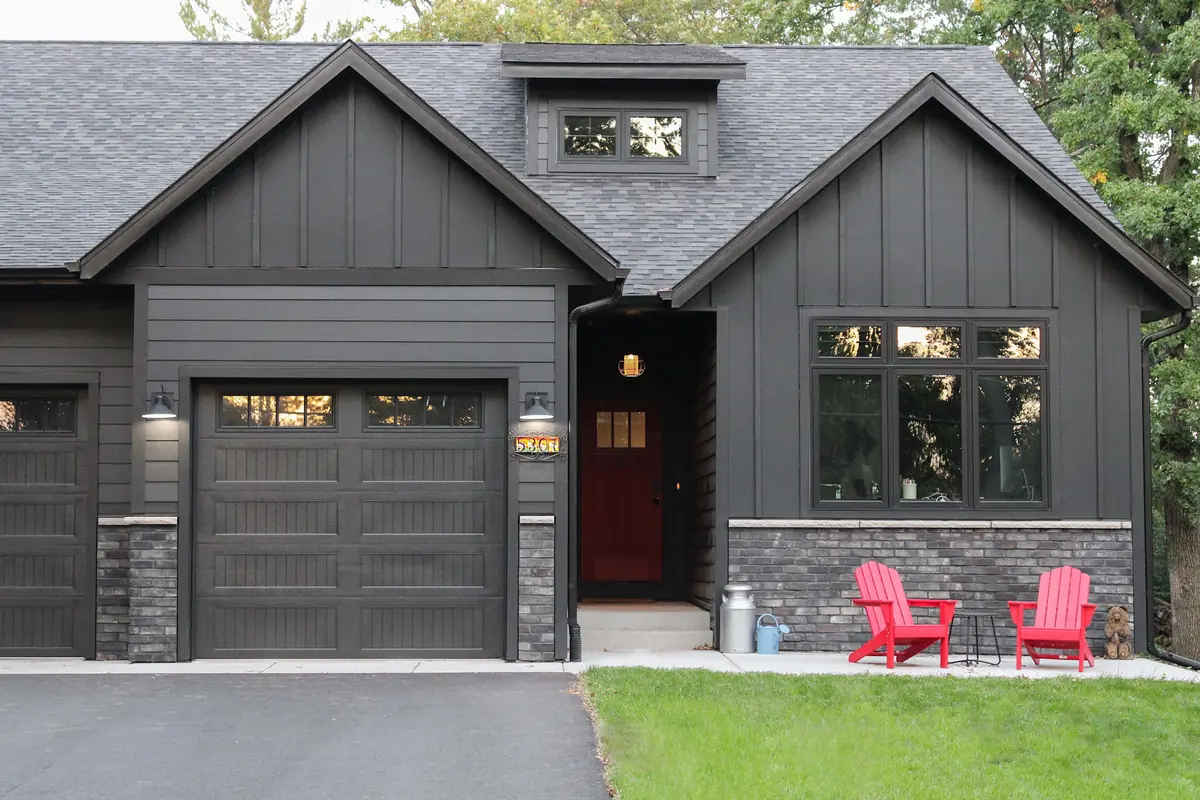 Home finished in LP SmartSide ExpertFinish Abyss Black with board-and-batten gables and lap siding