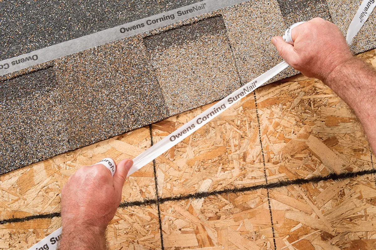 Close-up of the SureNail fabric strip in the nailing zone of Owens Corning Duration shingles
